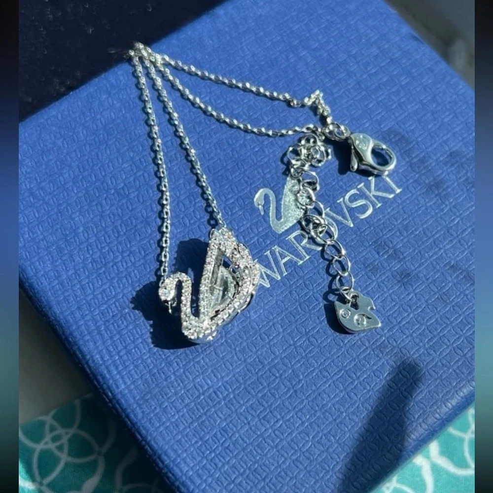 - Swan necklace white rhodium plated from swarovski